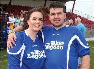  ??  ?? Lisa and Thomas McCarrick at the football match in memory of their dad, Paddy.