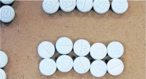  ?? THE ASSOCIATED PRESS FILES ?? Fentanyl pills are shown in an undated file photo. Canada’s anti- money laundering agency is helping fight the scourge of fentanyl by tracing the illicit movement of funds tied to the deadly drug.