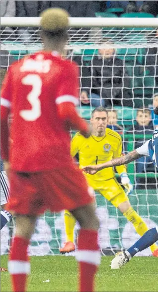  ??  ?? BAIRN BLAST: Falkirk’s Fraser Aird fires home the opener past Scotland goalkeeper Allan McGregor