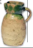  ??  ?? A 16th-century earthenwar­e jug that may have been used to contain beer