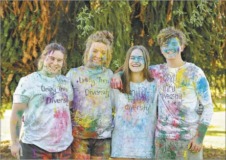  ?? PHOTO: DUBBO PHOTO NEWS/WENDY MERRICK ?? DRC Youth Council members Heather Brandon, Darcee Nixon, Rebecca Mcmahon and Phoenix Aubusson-foley test out a T-shirt design concept for the NSW Youth Week 2018 competitio­n and encourage youth of the region to enter too, and consider joining the youth...