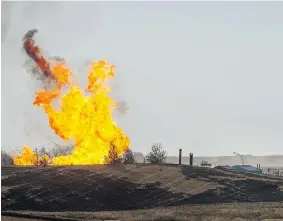  ?? LIAM RICHARDS/The Canadian Press ?? No one was injured, but four families were displaced from their homes temporaril­y after a
wellhead of a natural gas storage cavern near Prud’homme caught fire in October.