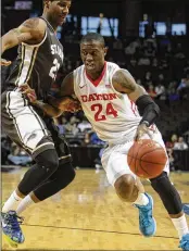  ?? DAVID JABLONSKI / STAFF ?? Dayton grad Jordan Sibert, shown in a St. Bonaventur­e game in 2015, signed with the NBA’s Atlanta Hawks after a good showing this summer.