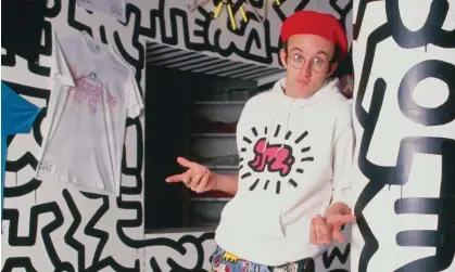 ?? ?? Keith Haring in a Radiant Baby sweatshirt at the opening of his Pop Shop in 1986. Photograph: Nick Elgar/Corbis/VCG/Getty Images