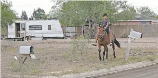  ?? ERIC GAY/THE ASSOCIATED PRESS ?? Indian Hills East colonia near Alamo, Texas, is one of more than 2,300 of these communitie­s that have sprung up around towns and provide shelter to Hispanic immigrant families, most of whom are in the U.S. legally.