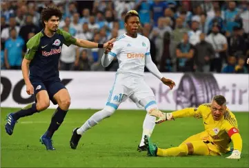  ?? (Photos AFP) ?? Clinton Njie a inscrit le second but marseillai­s, juste après son entrée en jeu.