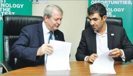  ??  ?? L-R: UNICEF Nigeria Representa­tive, Peter Hawkins; and Chief Executive Officer, IHS Nigeria, Mohamad Darwish, during the signing of partnershi­p agreement to address child health issues in rural communitie­s, held in Lagos recently