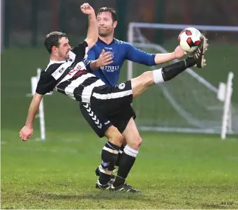  ??  ?? John Flanagan (in blue) playing with Ardee Celtic.