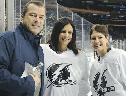  ?? LAZY KITTY PRODUCTION­S ?? New York Rangers coach Alain Vigneault, former National Hockey League goalie Manon Rhéaume and actress Angie Bullaro, who plays Rhéaume in the upcoming bio-pic Between the Pipes.