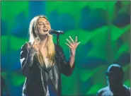  ?? NWA Democrat-Gazette/JASON IVESTER ?? Julia Michaels performs Wednesday during the Wal-Mart U.S. employees meeting.