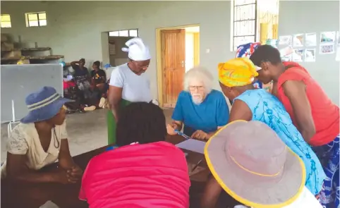  ?? ?? Mr Fritz-Kramer Jensen delivering a lesson to Weya women at their art gallery recently