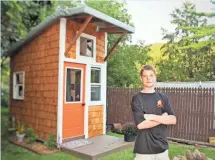  ?? SPECIAL TO THE REGISTER ?? Eighth-grader Luke Thill, 13, built his own tiny home right in his parents’ backyard.