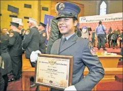  ??  ?? Making the cut: Chris Arnaud became one of the FDNY’s probationa­ry female firefighte­rs last year, but not all women want that kind of career.