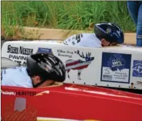  ?? MARIAN DENNIS – DIGITAL FIRST MEDIA ?? Drivers gear up for their race down Wilson Street Saturday during the Pottstown Soap Box Derby. The race brought in 34 drivers competing for the top spot in their divisions.