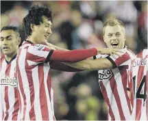  ??  ?? Ji celebrates with Seb Larsson.