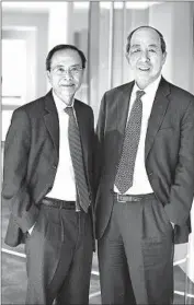  ?? Seth Joel ?? CATHAY GENERAL, the L.A. parent of Cathay Bank, recently made its final TARP payment. Above, CEO Dunson K. Cheng, left, and COO Peter Wu.