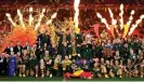  ?? Photograph: Gareth Copley/ Getty Images ?? The victorious teams pose on the pitch at Old Trafford.