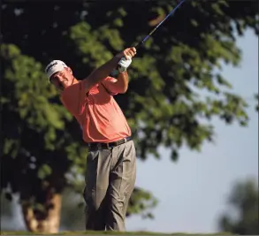  ?? Matt Slocum / Associated Press ?? Jerry Kelly hits a drive on the 10th hole during the first round of the PGA Championsh­ip in 2011. Kelly, a Hartford graduate, took to Twitter on Thursday to express his unhappines­s with the school’s plan to drop to Division III.