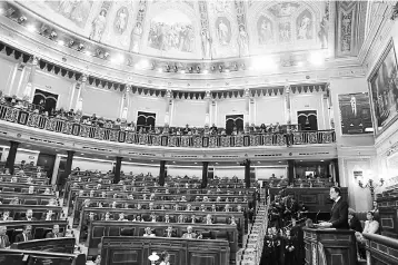  ??  ?? Spanish Prime Minister Mariano Rajoy (right) addresses the parliament in Madrid on October 11, in Madrid. Spain threatened to suspend Catalonia’s autonomy if it follows through on its threat to break away as an independen­t country. — AFP photo