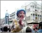  ??  ?? A child is pictured as demonstrat­ors protest against Syria's President Bashar alAssad in Khalidieh, near Homs,