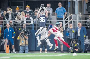  ?? USA TODAY SPORTS ?? The Cowboys’ Dalton Schultz, No.86, catches a pass for a touchdown against the Giants.