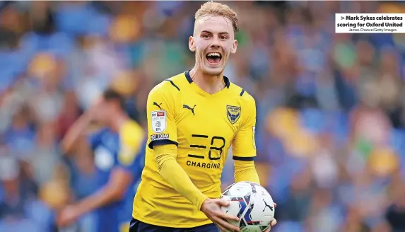  ?? James Chance/Getty Images ?? Mark Sykes celebrates scoring for Oxford United