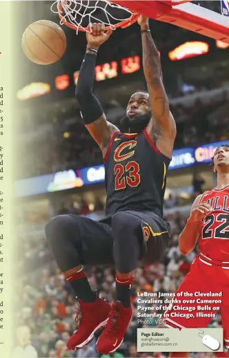  ?? Photo: VCG ?? LeBron James of the Cleveland Cavaliers dunks over Cameron Payne of the Chicago Bulls on Saturday in Chicago, Illinois.