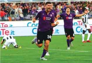  ??  ?? Fiorentina’s Marco Benassi celebrates after scoring the winner against Udinese Photo: AP