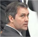  ??  ?? Former North Charleston Police officer Michael Slager faces life in prison and a $250,000 fine.
2016 POOL PHOTO VIA GETTY IMAGES