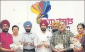  ?? HT PHOTO ?? ■ Tourism and cultural affairs minister Charanjit Singh Channi (centre) launching the badge of logo for the 550th birth anniversar­y of Guru Nanak on Saturday.