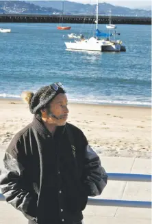  ?? Carlos Avila Gonzalez / The Chronicle ?? Bryan Pennington, who never had a permit for his boat, stands near the bleachers off the beach at Aquatic Park in February.