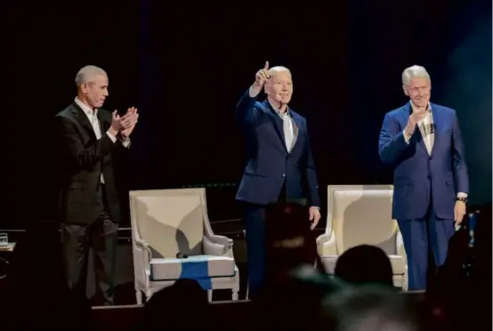  ?? ALEX BRANDON/ASSOCIATED PRESS ?? President Biden was joined by former presidents Barack Obama and Bill Clinton at Radio City Music Hall in New York City.