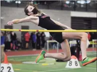  ?? Brian A. Pounds / Hearst Connecticu­t Media ?? Fairfield Warde’s Meg Barnouw wins the high jump at the Class L championsh­ips at the Floyd Little Athletic Center in New Haven on Saturday.