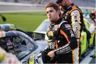  ?? The Associated Press ?? ■ Noah Gragson prepares on pit road for the NASCAR Xfinity Series race at Daytona Internatio­nal Speedway on Aug. 27, 2021, in Daytona Beach, Fla. The star Xfinity Series driver for JR Motorsport­s is in the spotlight again for all the wrong reasons: the poor choices he’s making on track that are slowing Gragson’s career progressio­n.