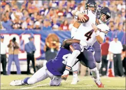  ?? AP ?? GOTCHA! Giants linebacker Markus Golden takes down Bears quarterbac­k Chase Daniel for an 8-yard sack Friday night.