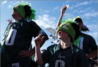  ?? THE ASSOCIATED PRESS ?? Philadelph­ia Eagles fans cheer before Super Bowl LVII.