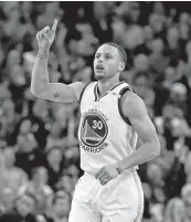  ?? JOSE CARLOS FAJARDO/STAFF ?? Warriors guard Stephen Curry, who had 17 points in the final 3:36 of the third quarter, gestures after a basket.