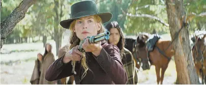  ??  ?? SOLE SURVIVOR: Rosamund Pike plays Rosalie, a woman whose family is killed by Apache bandits.