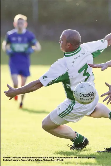  ??  ?? Donard-The Glen’s William Rooney and AGB’s Philip Healy compete for the ball during the SFL Division 2 game in Pearse’s Park, Arklow. Picture: Garry O’Neill