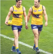 ??  ?? EAGLES DARE Brophy with team-mate Shannon Hurn