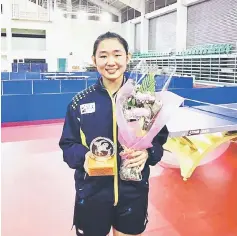  ??  ?? Alice Chang with her trophy after the prize presentati­on.