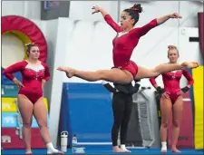  ?? SARAH GORDON/THE DAY ?? Norwich Free Academy’s Trinity Ambruso performs her floor routine in the ECC gymnastics championsh­ips at the Thames Valley Academy of Gymnastics in North Franklin on Sunday.