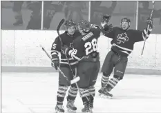  ?? CAROLE MORRIS-UNDERHILL ?? Manuel Manero celebrates his goal with teammates Ben Dixon, left, and Wesley Demone.