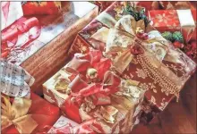  ??  ?? Reducing waste come the holiday season does not mean celebrants have to forgo big family meals or beautifull­y wrapped gifts.