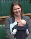 ??  ?? „ Liberal Democrat deputy leader Jo Swinson with her baby Gabriel.