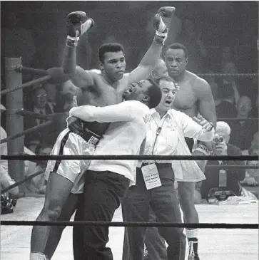  ?? Universal History Archive ?? MUHAMMAD ALI celebrates his 1965 victory over Sonny Liston, a first-round knockout. Ali died Friday after being hospitaliz­ed with a respirator­y illness.