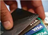  ?? Associated Press file photo ?? Issuers of airline- and hotel-branded credit cards are making it more attractive to use their cards by increasing the points consumers can earn for everyday spending.