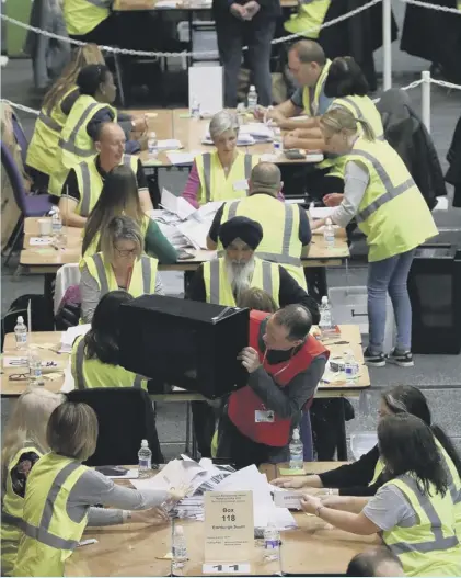  ?? PICTURE: SWNS ?? 0 Voting papers are counted during the European Parliament­ary elections count at the Internatio­nal Conference Centre in Edinburgh yesterday