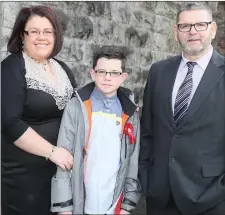  ??  ?? Adam Reilly with his parents Ruth and Paul at Tullyallen Confirmati­on