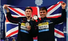  ?? ?? Noah Williams and Thomas Daley hold up their silver medals after the Men's synchroniz­ed 10m platform diving final at the World Aquatics Championsh­ips in Doha. Photograph: Hassan Ammar/AP